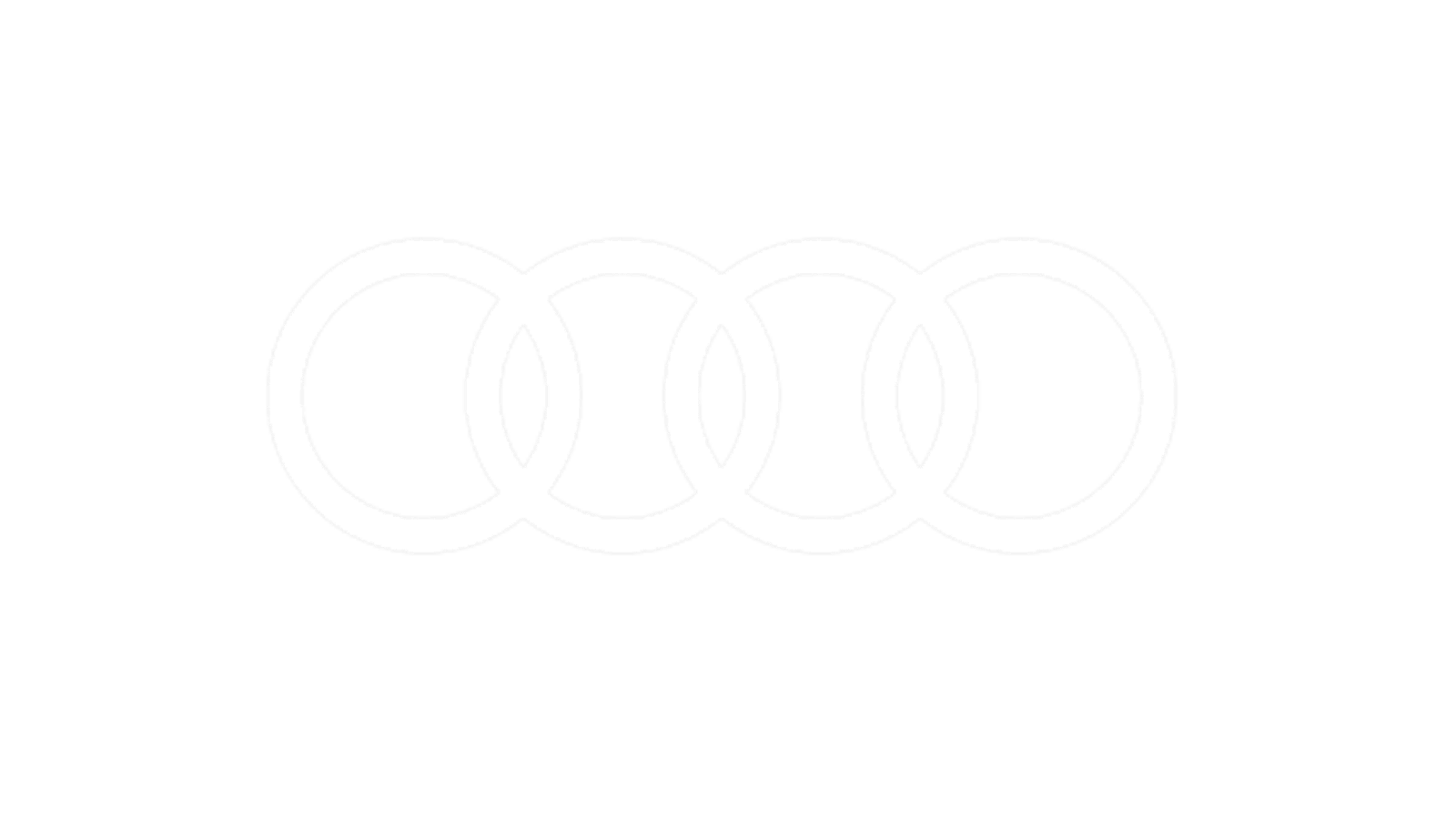 Das Bild zeigt vier ineinander greifende Ringe, die horizontal in der Mitte vor einem hellgrauen Hintergrund angeordnet sind.